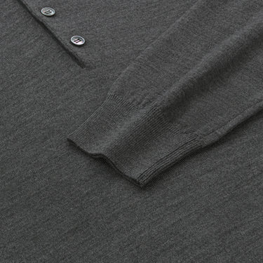 Detail of sleeve and cuff on Malo UXD127 F2Z10 E1469 dark grey melange virgin wool sweater polo shirt, emphasizing soft knit texture and quality.