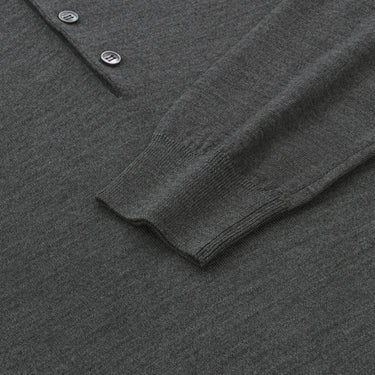Detail of sleeve and cuff on Malo UXD127 F2Z10 E1469 dark grey melange virgin wool sweater polo shirt, emphasizing soft knit texture and quality.