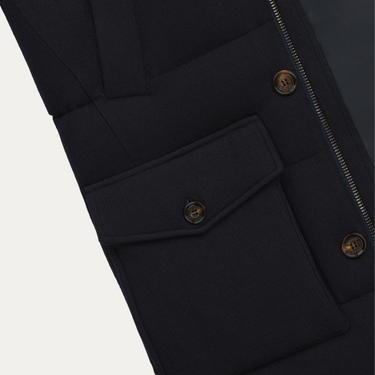 Close-up of Kired Hooded Down Winter Jacket in Blue showing front flap pocket with button closure, crafted for functionality and style.