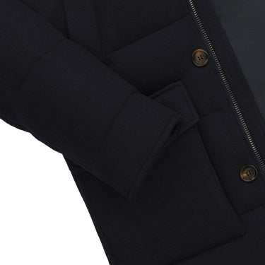 Detailed sleeve and pocket view of Kired Hooded Down Winter Jacket in Blue, emphasizing ribbed cuff and premium stitching.