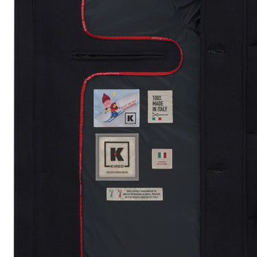 Interior label of Kired Hooded Down Winter Jacket in Blue, featuring 'Made in Italy' and goose down info, part of SARTALE's luxury outerwear.