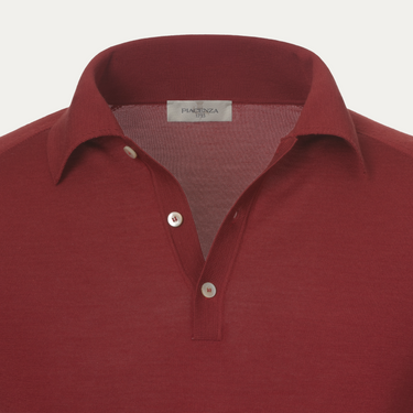Polo de lana virgen en color rojo óxido