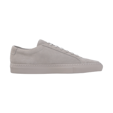 Side profile of light grey Common Projects Achilles Tonal suede sneaker, featuring clean lines and premium craftsmanship.