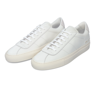 Common Projects 2486 0506 'Tennis Classic' white leather sneakers with minimalist design and premium stitching, available at SARTALE.