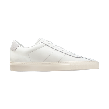 Side profile of Common Projects 2486 0506 sneaker in white leather with tonal stitching and suede heel tab, part of SS25 collection.