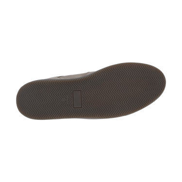 Outsole of Common Projects grey 'Decades' sneaker featuring herringbone tread pattern for grip, designed for SS25 fashion season.