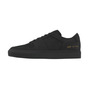 Common Projects sneaker in black with signature gold foil code 2487 42 7547 on heel, part of SS25 collection at SARTALE.