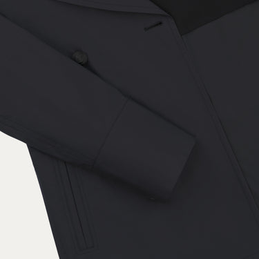 Detail of sleeve and button area on Sealup Amalfi Peacoat in Dark Blue. Sophisticated design from SARTALE’s Spring/Summer 25 apparel line.