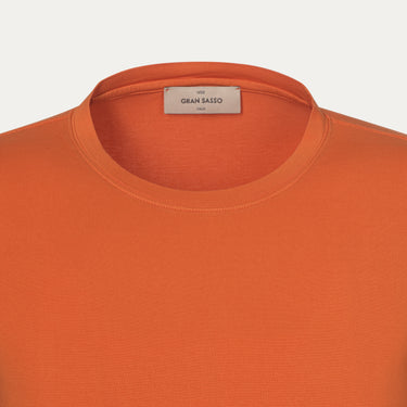 Camiseta de algodón con cuello redondo en color naranja brillante