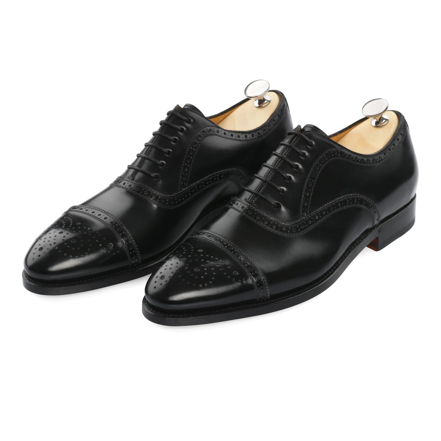 «Bellantonio» Six-Eyelet Leather Oxford Shoes with Perforated Details and Medallion in Nero Black