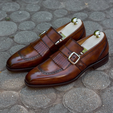 Buckle Loafers with Kiltie Fringe and Perforated Brogue Detailing in Brown