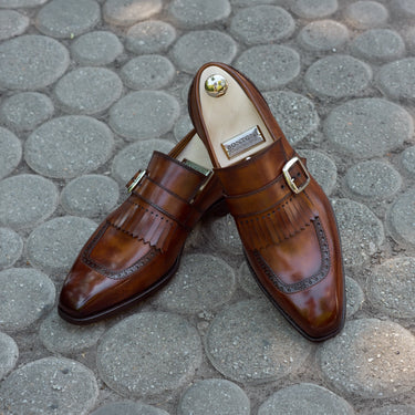 Buckle Loafers with Kiltie Fringe and Perforated Brogue Detailing in Brown