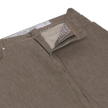 Close-up of zip fly and waistband on Richard J. Brown Brown Melange Regular-Fit Jeans, highlighting fine stitching and fabric texture.