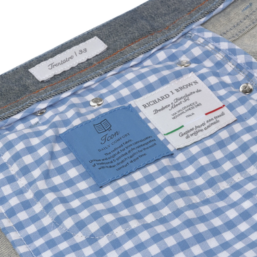 Interior label and lining detail of Richard J. Brown Regular-Fit Jeans in Blue Melange, featuring Italian craftsmanship and soft cotton fabric.