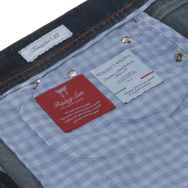 Interior label detail of Richard J. Brown Regular-Fit 5 Pocket Denim Jeans in Dark Blue, featuring Rising Sun lining and brand tags for authenticity.