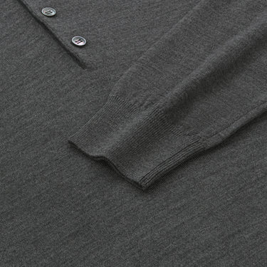 Detail of sleeve and cuff on Malo UXD127 F2Z10 E1469 dark grey melange virgin wool sweater polo shirt, emphasizing soft knit texture and quality.
