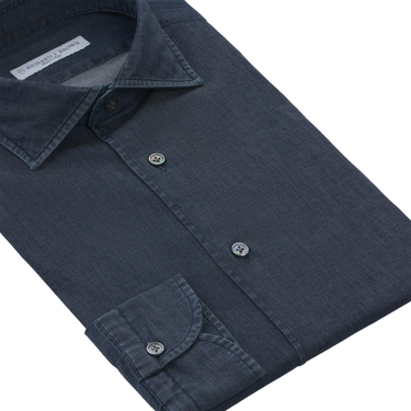 Close-up of Richard J. Brown cotton denim dark blue shirt highlighting fine stitching, button details, and soft denim material.